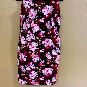 This dress was worn once. It is in like new condition.The pockets are unopened.